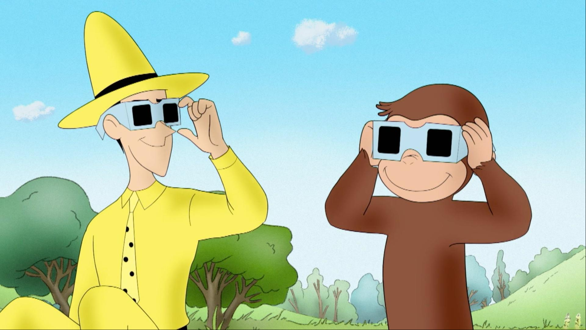George watches the solar eclipse. / George & Bill rake leaves.