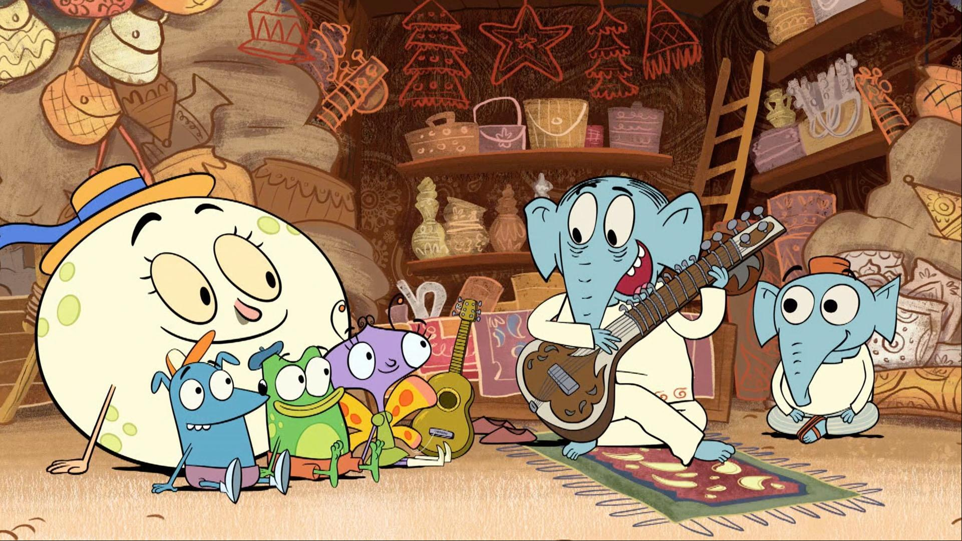 Carmen, Leo and Andy learn about the difference between a guitar and an Indian sitar.