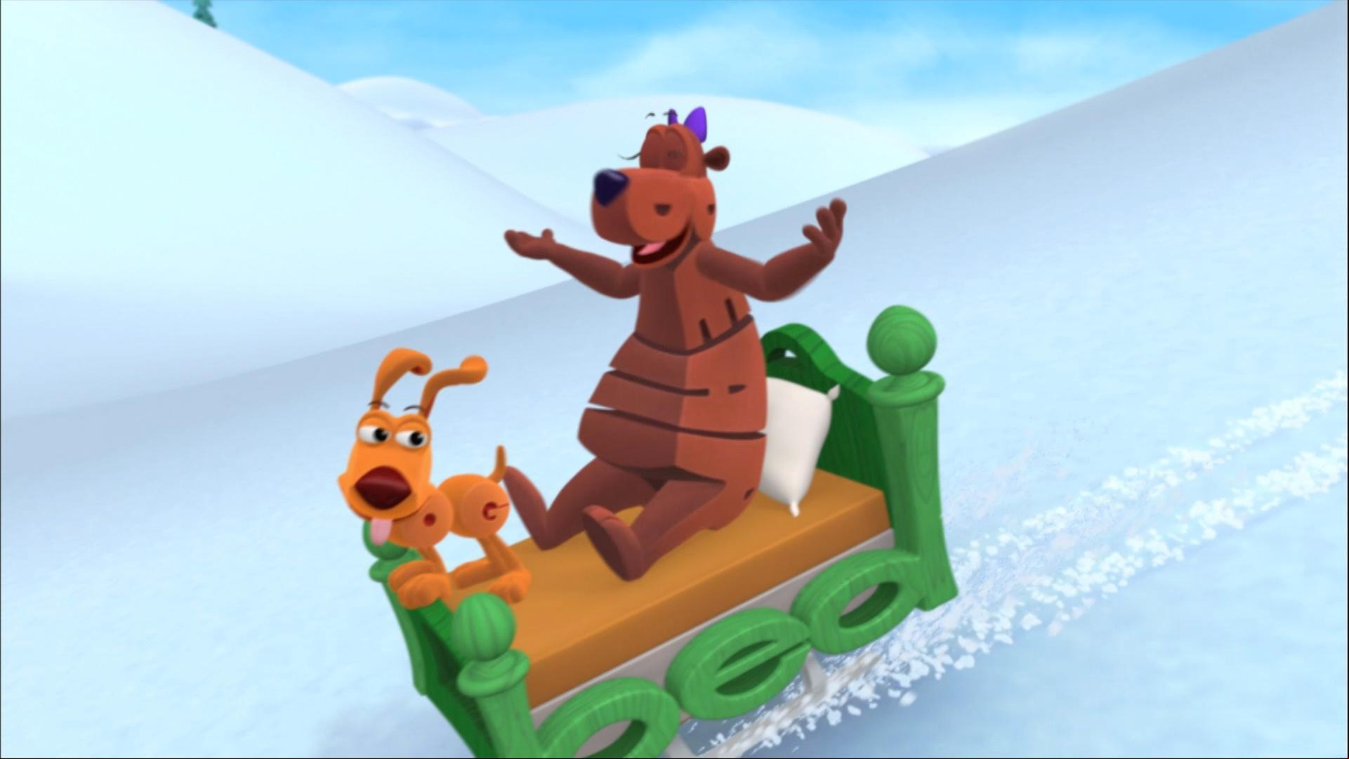 Bear gets help sledding in the snow. / Shark is misunderstood.