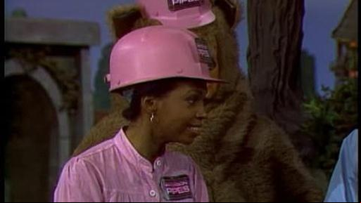 Touring the "Mister Rogers' Neighborhood" television studio and meeting the staff.