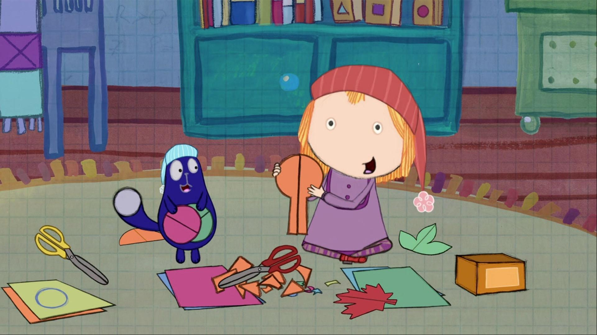 Peg and Cat are cutting out symmetrical shapes before bedtime.