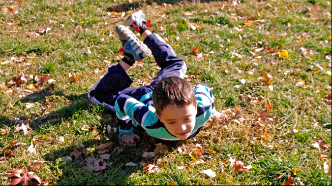 Boy doing snail crawl