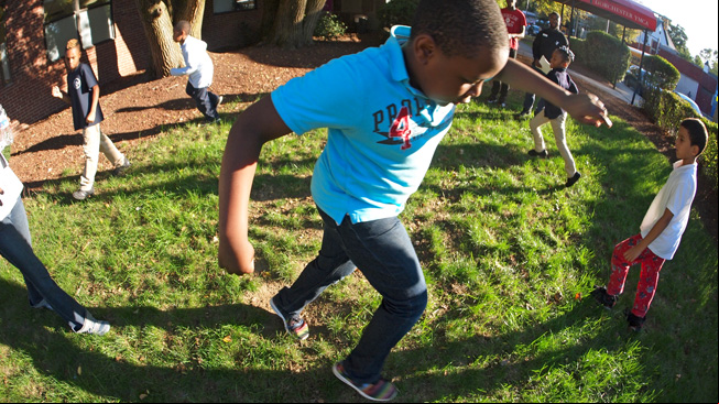Children chasing shadows
