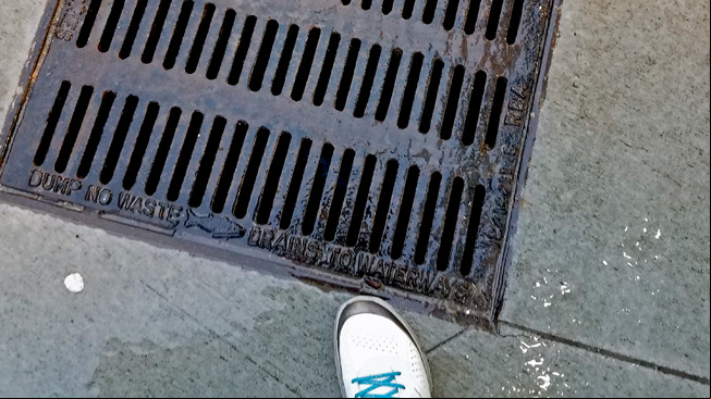 Water flows to storm drain