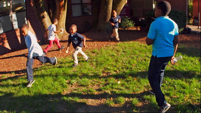 Group of children playing tag