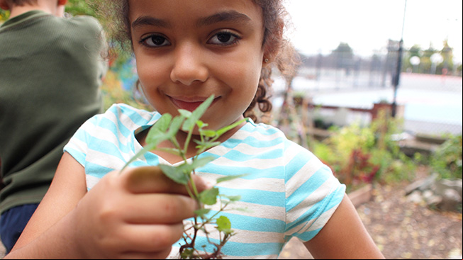 Girl with plant