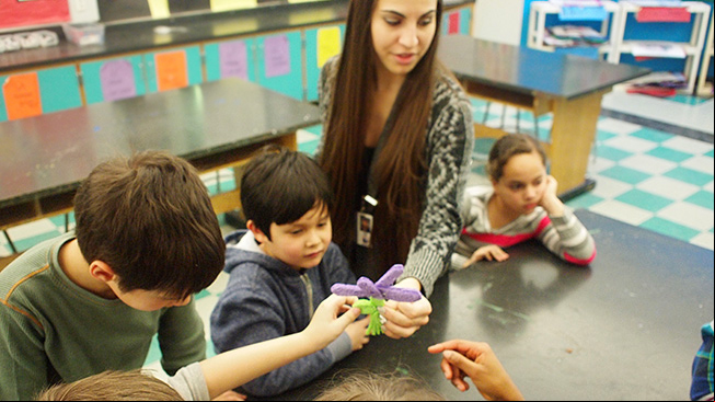 Teacher with students