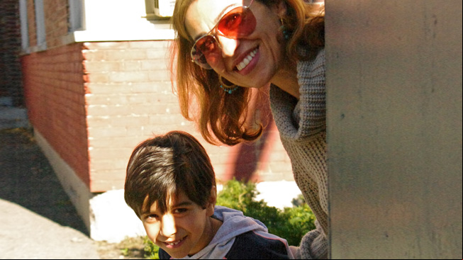 Boy and mom in shadows