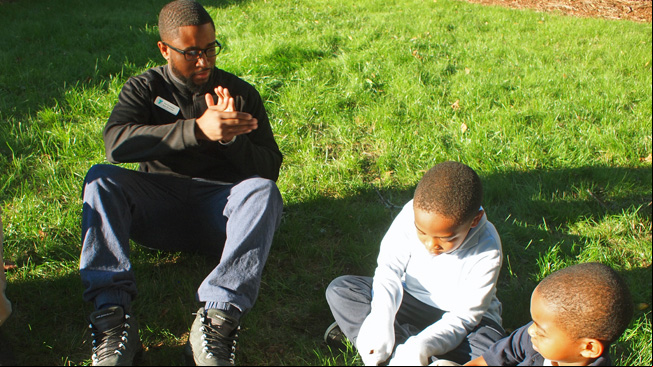 Educator talks to kids