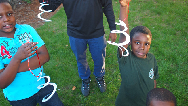 Kids with wind spinners